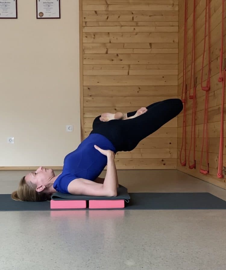 Therapeutic pose with blocks for back relief